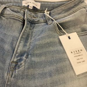 Beautiful Flare jeans with a white patter at bottom. Very stretchy.